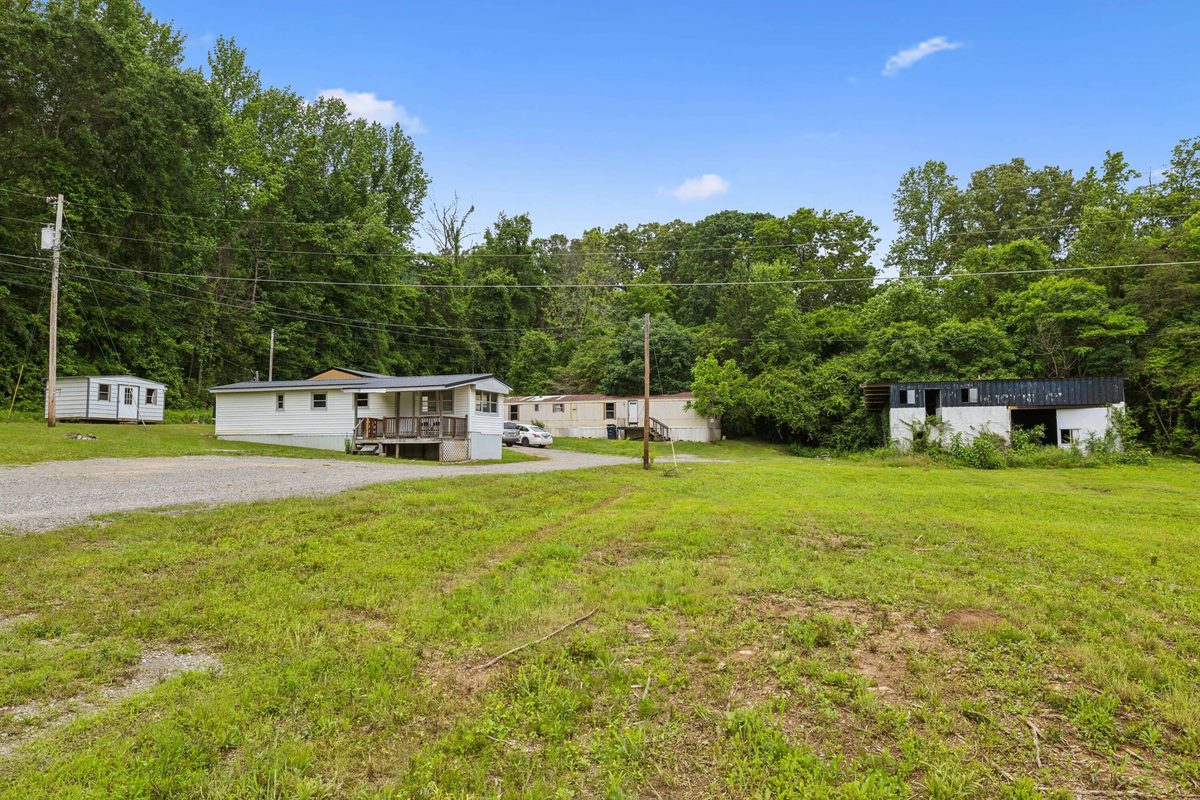 Park-owned homes and open lawn area at the community
